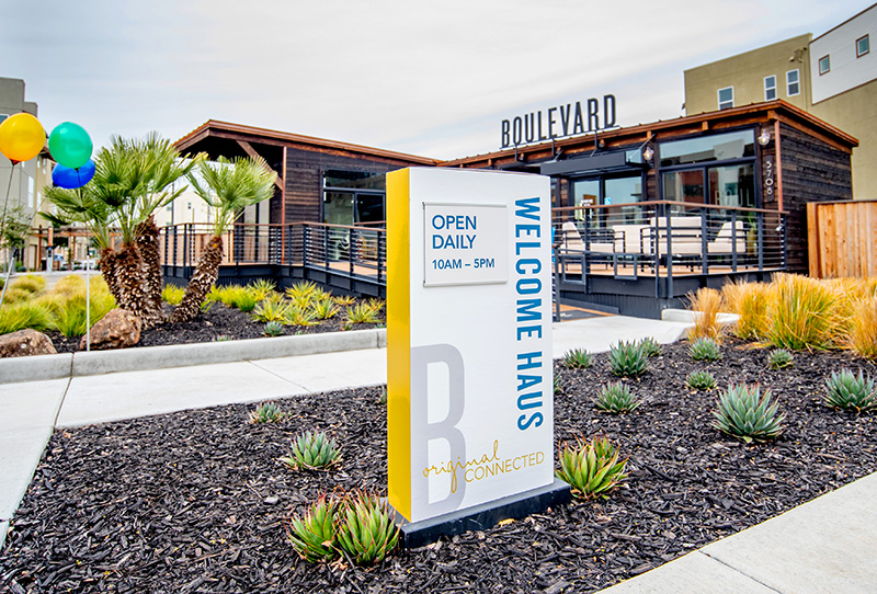 Boulevard welcome sign, sales environments and signage for new home builders